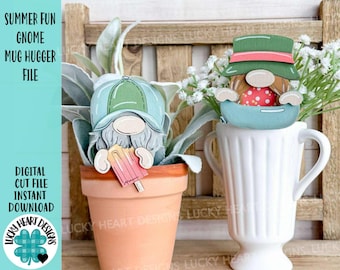 May include: Two summer gnome mug huggers, one with a green hat and the other with a blue baseball cap. Both gnomes are holding popsicles. The gnomes are sitting in flower pots.