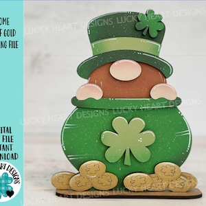 May include: A green gnome holding a pot of gold. The gnome is wearing a green hat with a shamrock on top. The pot of gold is filled with gold coins. This is a digital cut file for crafting.