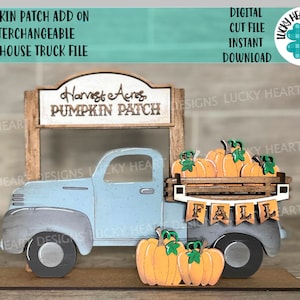 May include: A blue farmhouse truck with a wooden bed filled with orange pumpkins. The truck has a wooden sign above it that reads "Harvest Acres Pumpkin Patch". A wooden "Fall" banner hangs from the back of the truck.