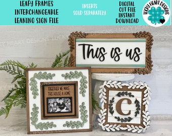 May include: Three wooden signs with leafy frames. The top sign says "This is us". The middle sign says "Together we make this house a home". The bottom sign has a letter "C" in the center.