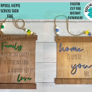 Peut inclure: Deux panneaux en bois enroulables avec une finition brune rustique. Le panneau de gauche indique "Famille, un peu fou, un peu bruyant, et beaucoup d'amour." Le panneau de droite indique "La maison est là où vous êtes." Les deux panneaux ont une corde et des perles pour accrocher.