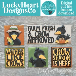 May include: Five decorative signs featuring black crow illustrations and text. One sign reads FARM FRESH & CROW APPROVED, another GATHER LIKE CROWS, and a third CROW SEASON IS HERE. The designs include crows with corn and pumpkins in orange and green.