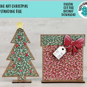 May include: String art Christmas tree and gift box craft project. The tree is green and white with red ornaments. The gift box is red and white with a green bow and a tag that says "To: You From: Me".