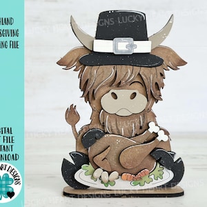 May include: A brown Highland cow wearing a black pilgrim hat with a white band and holding a roasted turkey. The cow is standing on a wooden base with a plate of food and greenery.