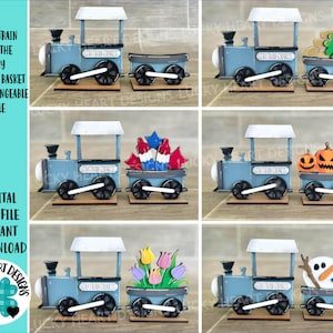 May include: A set of six interchangeable train car designs for a tiny flower basket. Each car features a different design, including a shamrock, fireworks, pumpkins, tulips, and a snowman. The train cars are painted blue and white with the words "Tiny Train Express" on the side.
