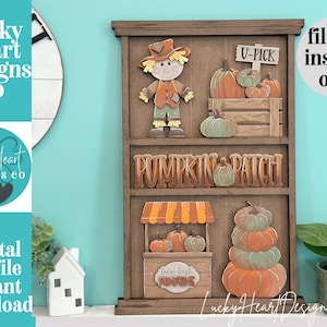 May include: A brown wooden tiered display board featuring layered cutouts of a scarecrow, pumpkins in a crate with a U-PICK sign, the text PUMPKIN PATCH, a farm stand with pumpkins, and a stack of pumpkins with the text farm fresh PUMPKINS.