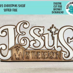 May include: A wooden cutout of the word "Jesus" with a star above it and the words "is the reason" below. The cutout is designed to be a shelf sitter for Christmas decorations.
