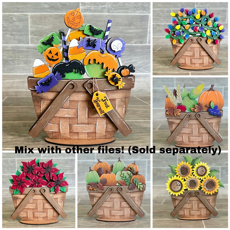 May include: A set of five wooden basket decorations featuring various autumnal and Halloween themes. The baskets are adorned with pumpkins, gourds, sunflowers, candy corn, bats, and a skull. The tag reads "Treat Yourself".
