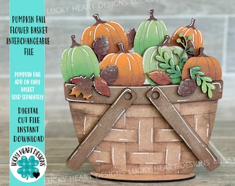 May include: A wooden pumpkin fall flower basket with a brown woven basket and a variety of orange and green pumpkins. The basket has a brown handle and is decorated with fall leaves and pine cones.