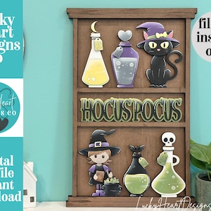 May include: A wooden tiered display shelf featuring decorative cutouts including a black cat in a purple hat, potion bottles, a witch figure, and a cauldron. The center shelf displays the text HOCUS POCUS in bold, dark green, dimensional lettering.