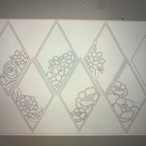 May include: A series of diamond-shaped cutouts with floral designs. Each diamond features a different floral pattern, including roses and succulents, all in a minimalist, line-art style. The cutouts are arranged in a grid.