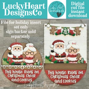 May include: Christmas-themed wooden signs featuring Santa and Mrs. Claus, gingerbread men, stockings, and a Christmas tree. The signs have the text "This house runs on Christmas cheer and cookies." The design is a digital cut file.