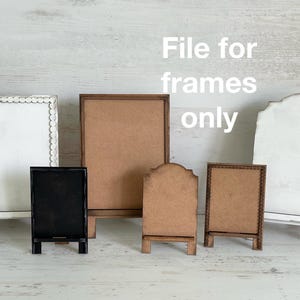 May include: A collection of small wooden frames in various shapes and sizes. The frames include a black chalkboard, a white scalloped frame, and several brown wooden frames. The text "File for frames only" is displayed in white.