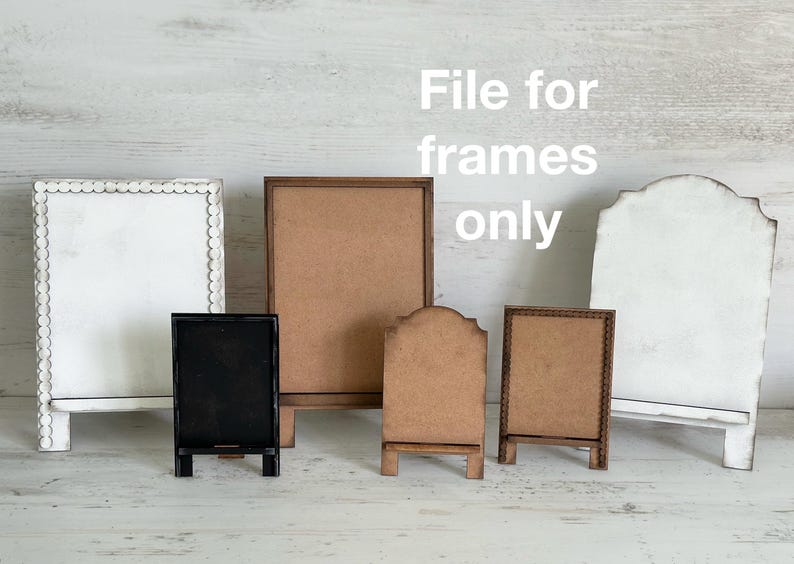 May include: A collection of small wooden frames in various shapes and sizes. The frames include a black chalkboard, a white scalloped frame, and several brown wooden frames. The text "File for frames only" is displayed in white.