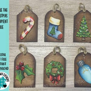 May include: Set of six wooden Christmas ornament tags with various designs, including a candy cane, stocking, Christmas tree, holly, wreath, and light bulb. The tags are brown with a white background and have a distressed look.
