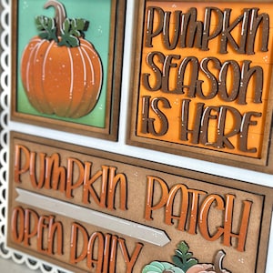 Peut inclure: Panneau d&eacute;coratif en bois avec bordure festonn&eacute;e blanche. Il pr&eacute;sente des citrouilles oranges et les inscriptions &laquo; Pumpkin Season Is Here &raquo; et &laquo; Pumpkin Patch Open Daily &raquo;. Th&egrave;me rustique et automnal.