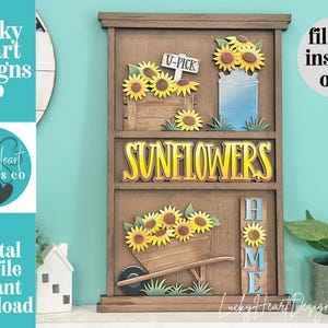 May include: A wooden tiered display sign featuring layered sunflower cutouts, a blue milk can, a wheelbarrow, and a sign reading U-PICK. The center features the word SUNFLOWERS in yellow, and a vertical sign on the right reads HOME with a sunflower.