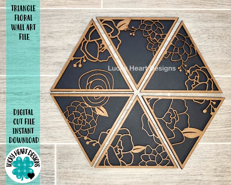 May include: Six black and gold wooden triangles with floral designs form a hexagon. The triangles are cut out with a floral pattern. The text "Lucky Heart Designs" is visible in the center of the hexagon.