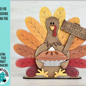 May include: A wooden turkey figurine holding a pie with the words "Happy Thanksgiving" on a sign. The turkey has brown feathers and a red wattle. The pie is brown with a white swirl on top. The sign is brown with white lettering.