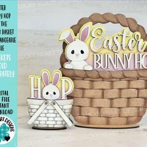 May include: A digital cut file for an Easter bunny hop basket with a white bunny and the text "Easter Bunny Hop".