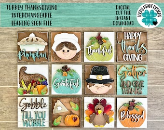 Op de afbeelding: Een verzameling verwisselbare houten borden met een Thanksgiving-thema. Elk vierkant bord toont een ander ontwerp, waaronder een pompoentaart, een pelgrim, een hoorn des overvloeds en de woorden "Happy Thanksgiving". De borden zijn in verschillende kleuren en stijlen, perfect voor seizoensdecoratie.