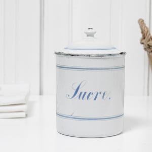 Antique French white enamel canister with faded blue trim and lettering, enameled metal storage jar SUCRE, Farmhouse kitchen decor