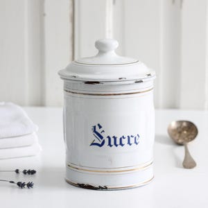 Antique French white enamel sugar canister with gold rim and blue lettering, enameled metal storage jar SUCRE, farmhouse kitchen decor