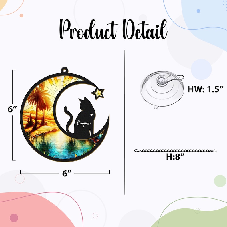 May include: A 6-inch diameter wooden moon and star ornament with a stained glass sunset scene. A black silhouette of a cat with the name "Cooper" is sitting on the moon. The ornament comes with a suction cup and an 8-inch chain.