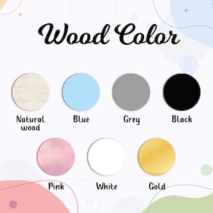 Pode incluir: Carta de cores de madeira com 10 cores diferentes: madeira natural, azul, cinza, preto, rosa, branco, dourado, vermelho, verde e marrom.