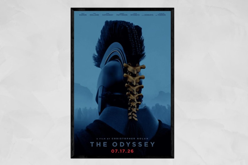 May include: A movie poster for The Odyssey, directed by Christopher Nolan, featuring a dark blue background and a central figure wearing a black helmet with a gold spine-like crest. The text reads The Odyssey and the date 07.17.26 in red.