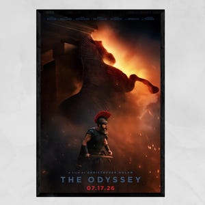 May include: A movie poster for The Odyssey, a film by Christopher Nolan, dated 07.17.26. The image features a warrior in a red-crested helmet and dark armor standing before a massive, dark horse silhouette emerging from golden fire and smoke.