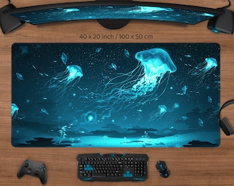 May include: A large rectangular desk mat with a luminous jellyfish design. The mat is 100 x 50 cm and features a dark blue background with glowing blue jellyfish and other aquatic elements. The website address www.deskneko.com is printed at the bottom.
