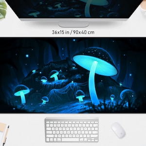 May include: A large, rectangular mousepad featuring a glowing blue mushroom scene. The mousepad measures 36x15 inches. The design includes several glowing mushrooms in a dark, fantastical forest setting, with a bright blue glow.