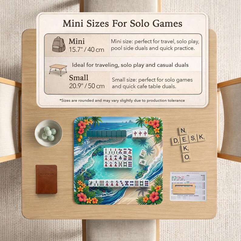 May include: A tabletop scene featuring a miniature Mahjong set with a tropical beach design. The set includes tiles, a brown leather-bound scorebook, and a small bowl with green stones. Text on the table reads "Mini Sizes For Solo Games."