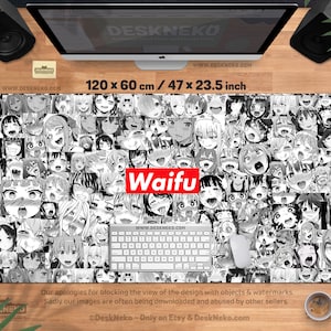May include: A large rectangular desk mat featuring a collage of anime-style faces in black and white. The word "Waifu" is printed in red and white. The mat measures 47 x 23.5 inches.