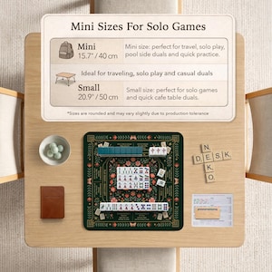 May include: A Mahjong set featuring a dark green floral play mat, white tiles with red and blue characters, a small bowl of green marbles, a brown notebook, and a wooden tile rack. An informational sign displays sizes of 15.7 inches and 20.9 inches.