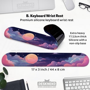 May include: A premium silicone keyboard wrist rest with a dreamy night sky design featuring a large peach-colored moon, clouds, and stars. The wrist rest is 17 x 3 inches and 1 inch thick. It has a non-slip base.