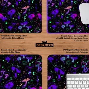 May include: Black mouse pads with a vibrant mushroom and celestial pattern in purple, teal, and pink. The pads have different edge styles and features, including LED lights and durable nylon edges. The brand name "DESKNEKO" is also visible.