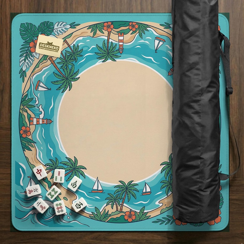 May include: A turquoise and beige mahjong mat with a tropical island design, featuring palm trees, sailboats, and a lighthouse. The mat has a large central beige circle and a black carrying case.