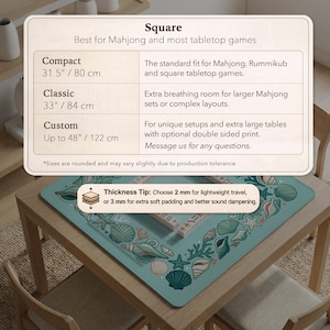 May include: A square, turquoise Mahjong table mat with a seashell border, resting on a wooden table. The mat is available in three sizes: Compact (80 cm), Classic (84 cm), and Custom (up to 122 cm). The text on the mat says "Thickness Tip: Choose 2 mm for lightweight travel, or 3 mm for extra soft padding and better sound dampening."