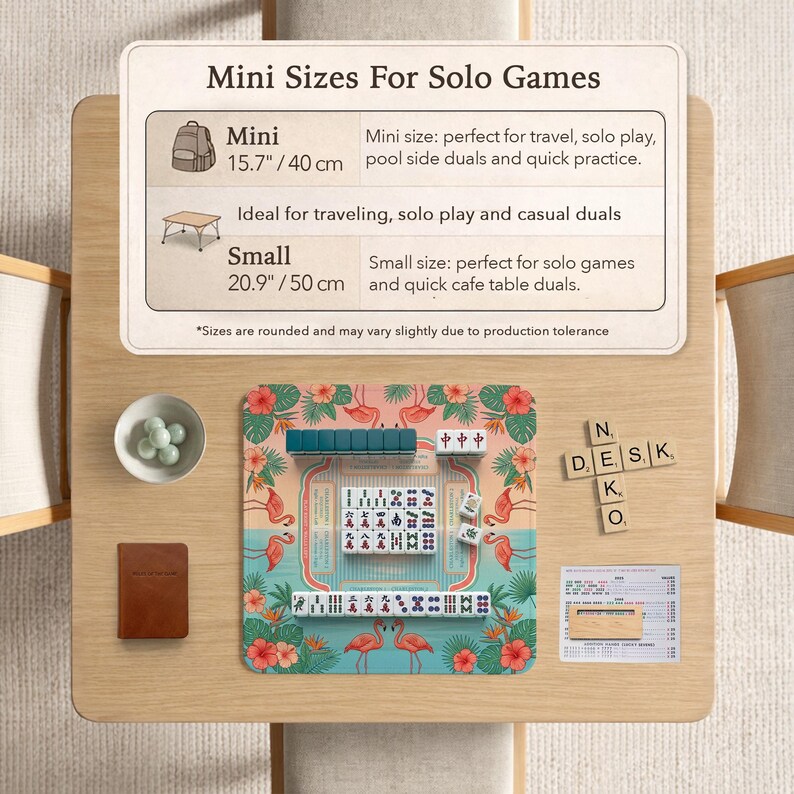 May include: A square mahjong mat with a pink flamingo and tropical flower pattern, featuring a central grid and rows of white tiles. Above, a sign reads Mini Sizes For Solo Games, listing 15.7 inches and 20.9 inches, with a small bowl and wooden tiles.
