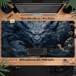 May include: A large desk mat featuring a detailed illustration of a blue dragon with red eyes. The mat measures up to 47 x 23.5 inches and includes the text "With optional LED/RGB lights". The desk mat is designed for computer use.