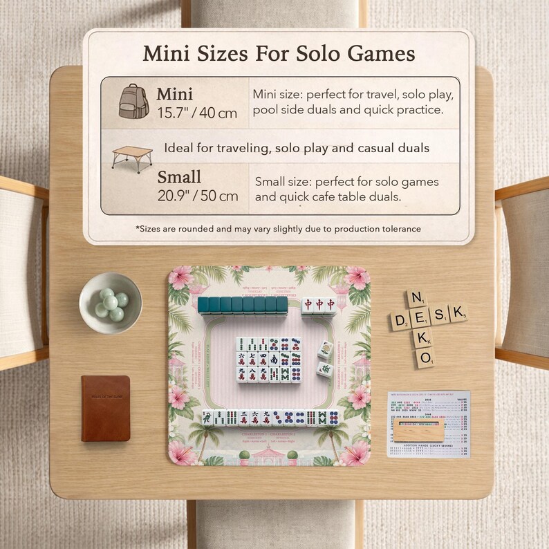 May include: A Mahjong set on a floral play mat with pink hibiscus and palm leaves. Includes tiles, a small bowl with green marbles, a brown notebook, and a wooden tile rack. Text reads: Mini Sizes For Solo Games, Mini 15.7 inches, Small 20.9 inches.