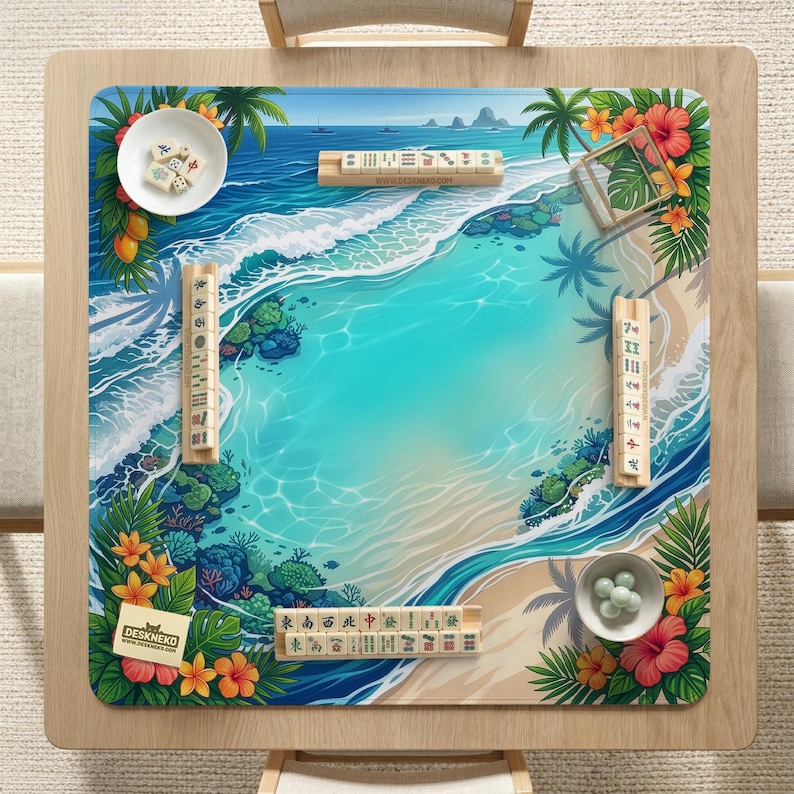 May include: A square wooden Mahjong game table with a tropical beach scene printed on the surface. The design features a turquoise ocean, sandy beach, palm trees, and colorful flowers. The table includes Mahjong tiles, dice, and bowls.