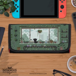 May include: A black and green Nintendo Switch case with a pixelated illustration of a cat gazing out of a window at a rainy scene. The window is framed by plants and pots. The case has a black border and the text "DESKNEKO" and "www.deskneko.com".