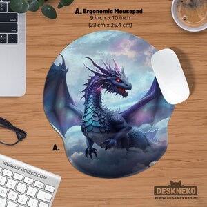 May include: Ergonomic mousepad with a dragon design. The mousepad is 9 inches by 10 inches and features a detailed illustration of a blue and purple dragon with red eyes against a cloudy sky background. Includes the text "A. Ergonomic Mousepad".