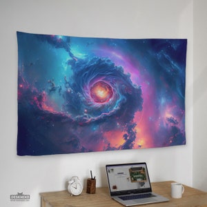 May include: A large tapestry featuring a vibrant depiction of a cosmic nebula. The artwork showcases a swirling vortex of blues, purples, and oranges, with a bright central core. The tapestry is hanging on a white wall above a wooden desk.