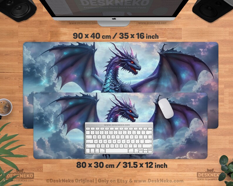 May include: Two rectangular desk mats with a fantasy dragon design. The larger mat measures 35 x 16 inches, and the smaller one is 31.5 x 12 inches. The dragon is purple, blue, and red, set against a cloudy sky background.