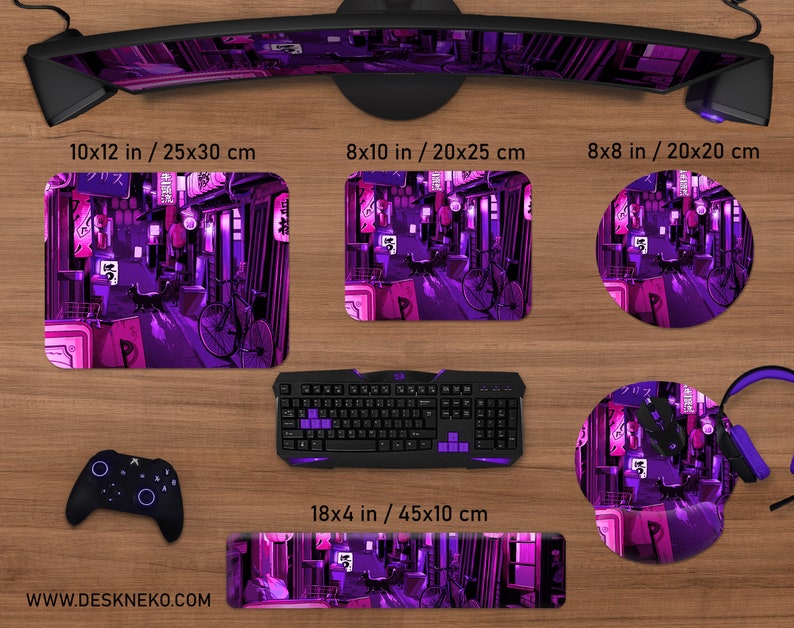 May include: A collection of computer accessories featuring a purple and pink cityscape design. Includes a 10x12 inch mousepad, a keyboard, a wrist rest, a controller, and a headset. The website address www.deskneko.com is visible.
