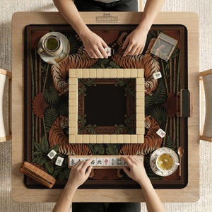 May include: A wooden Mahjong game table with a decorative mat featuring tigers and bamboo. The game is in progress, with tiles and tea cups visible. The table has the text "DESKNEKO" on the top.